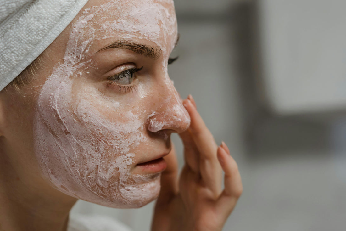 Young woman with clear, healthy skin looking at camera — Firmly cruelty-free guide to acne-prone skincare